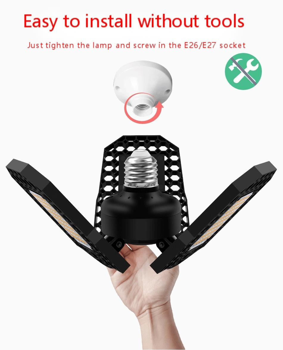 Hands holding LED garage light showing easy tool-free installation with E26/E27 socket.